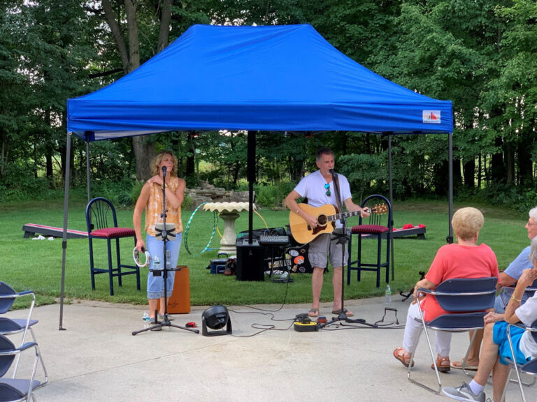 Cameron Woods residents enjoying a live music performance.